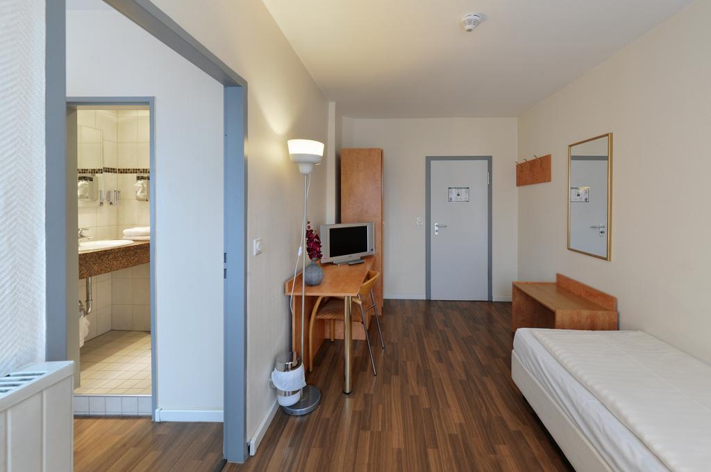 Fair Hotel Frankfurt - An Der Messe Франкфурт на Майн Стая снимка