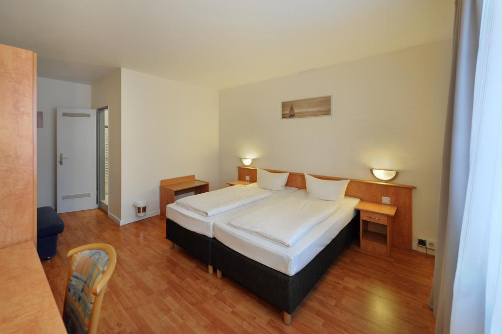 Fair Hotel Frankfurt - An Der Messe Франкфурт на Майн Стая снимка