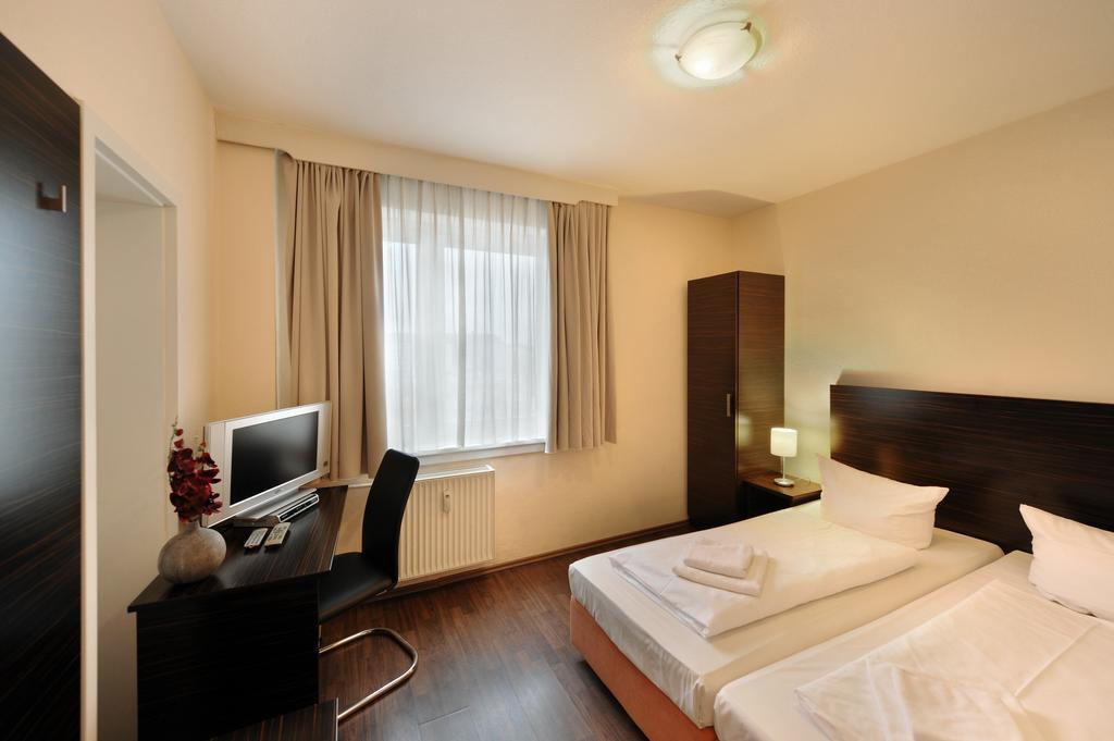 Fair Hotel Frankfurt - An Der Messe Франкфурт на Майн Стая снимка